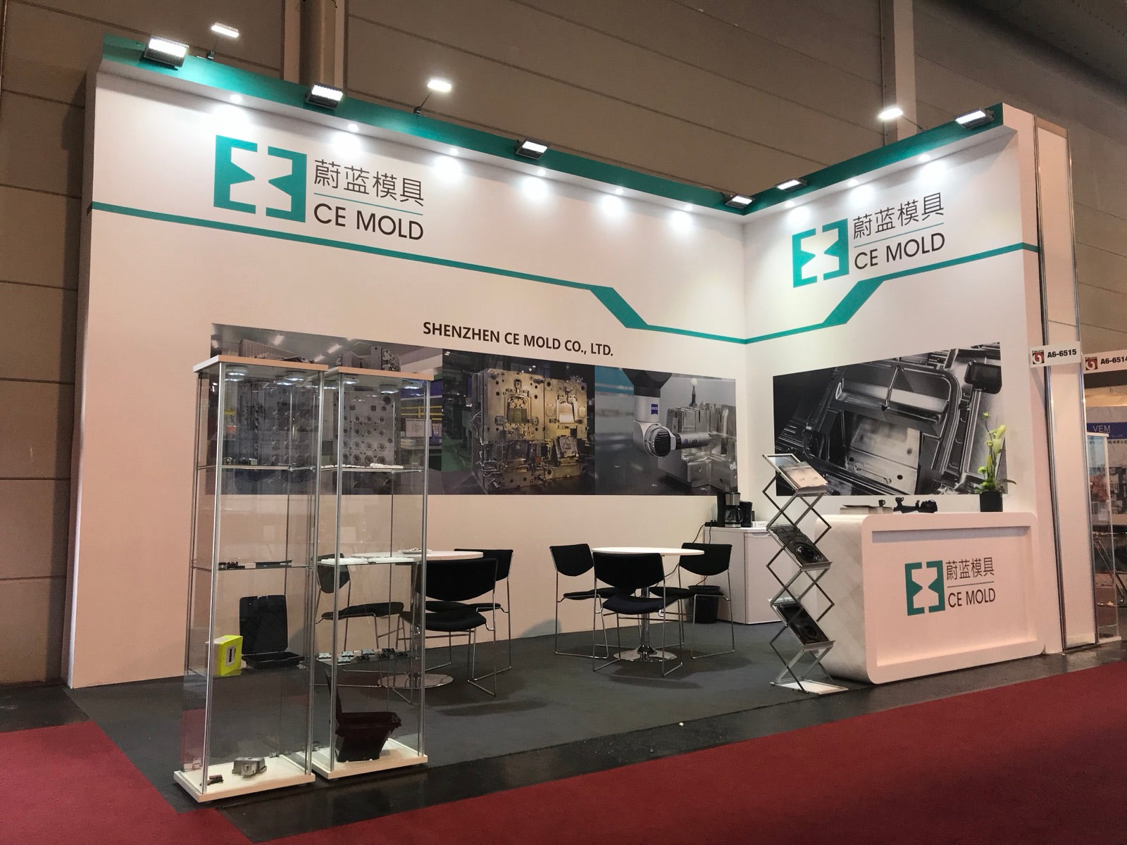 CE MOLD exhibition booth at Fakuma 2018 featuring precision mold samples and factory photography