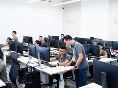 WEILAN MFG engineering team working at computer workstations